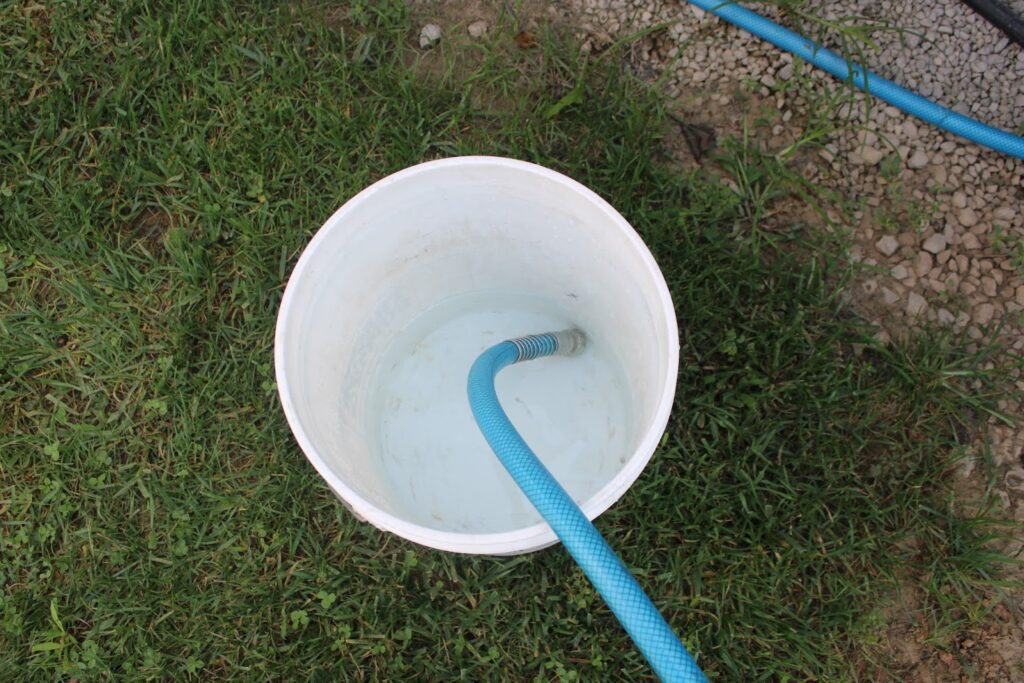 Garden hose in bucket