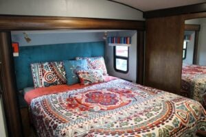 RV bedroom with outdated RV slide out trim