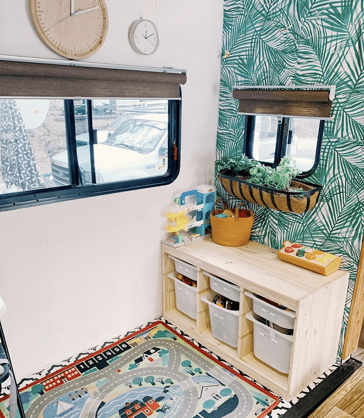 RV slide out area with leaf-print wallpaper