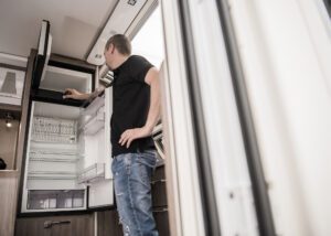 How to Winterize Your RV: Defrost the Fridge