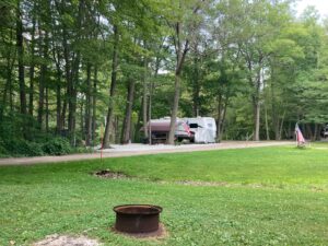 RV parked with American Flags