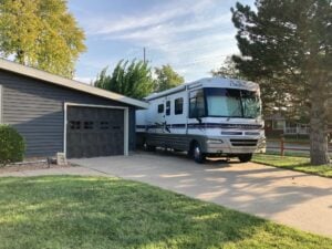 RV parked in driveway of home