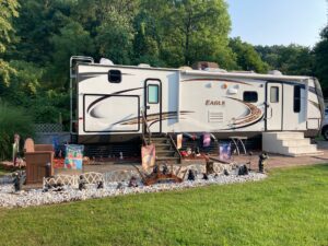 Travel Trailer with RV steps with a platform