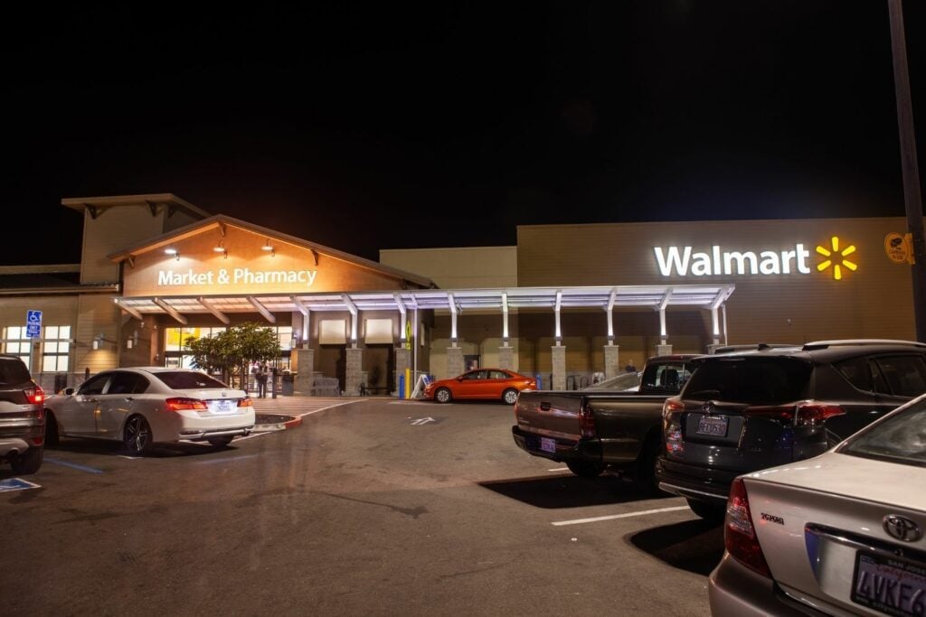 Walmart parking lot at night.