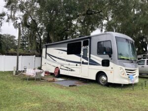 Class A RV parked on grass