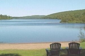 Luxury RV Resorts in Michigan. Swimming beach at Lake Fanny Hooe Resort.