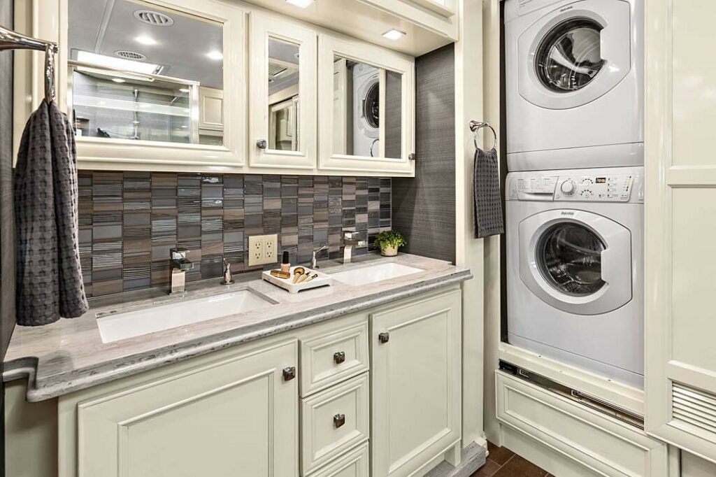 RVs with a washer and dryer insider the large bathroom. 