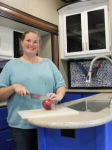 cropped-Woman-Chopping-Food-in-RV-Kitchen-scaled-1.jpg