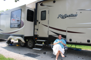 Woman drinking coffee fifth wheel RV