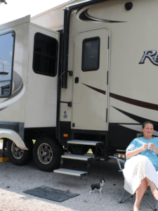 Woman drinking coffee fifth wheel RV