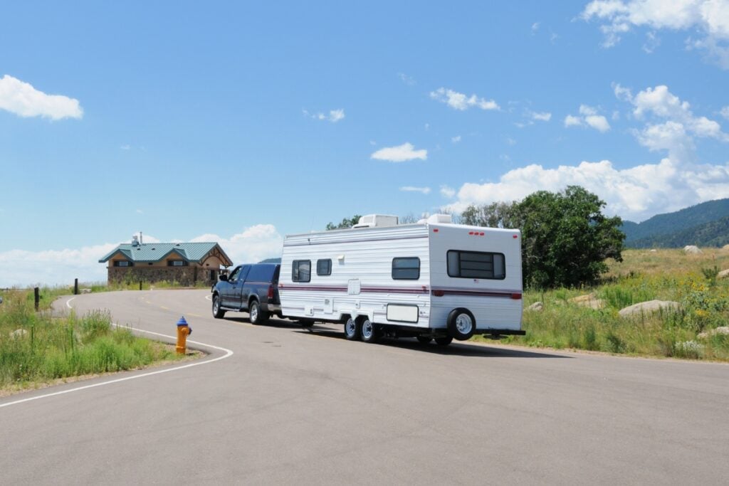 Travel Trailer RV driving away.