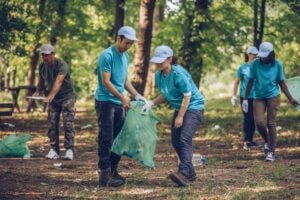 Volunteers cleaning up trail.