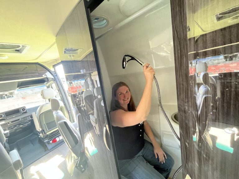 Woman sitting in RV wet bath