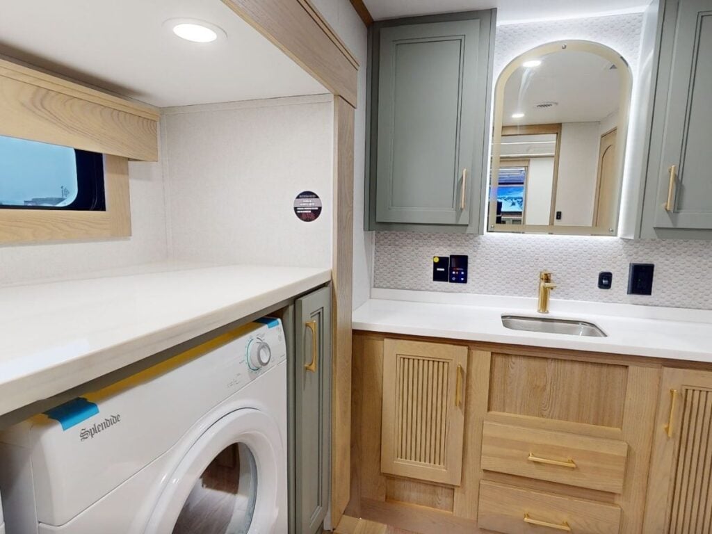 Fifth wheel RV bathroom with laundry station