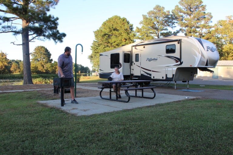 Full time RV living couple at campsite