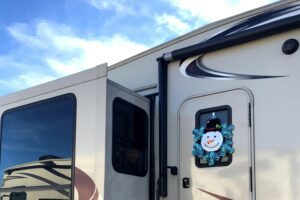 Snowman RV Christmas Decoration on Front Door.