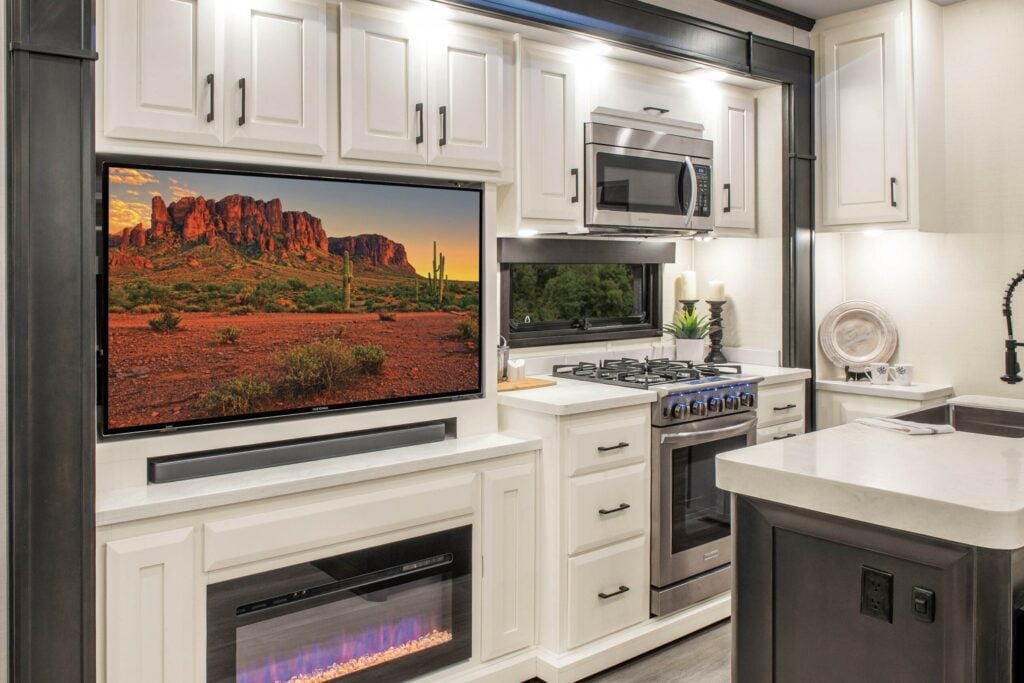 Kitchen and Entertainment Center in a Mobile Suites Fifth Wheel