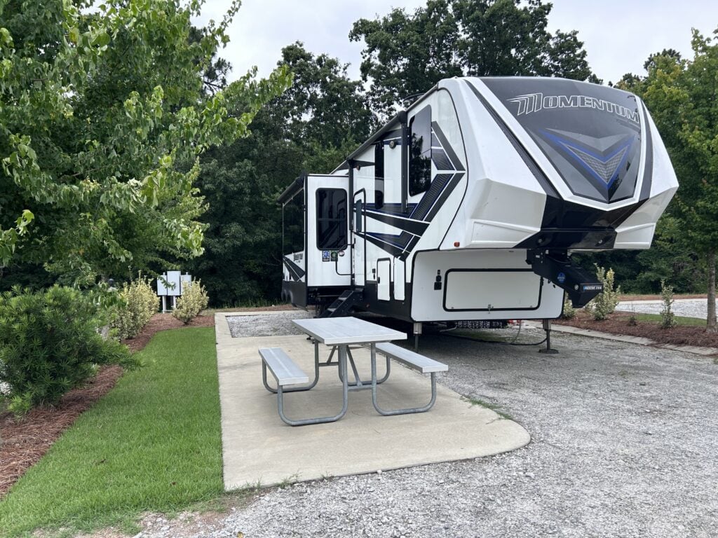 Fifth wheel RV at luxury RV resort campsite.