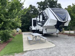 Fifth wheel RV at luxury RV resort campsite.