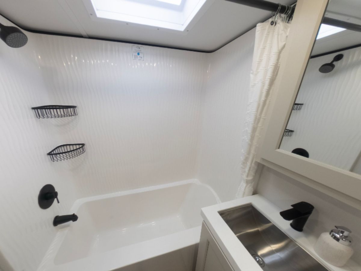 Grand Design RV bathroom with tub.
