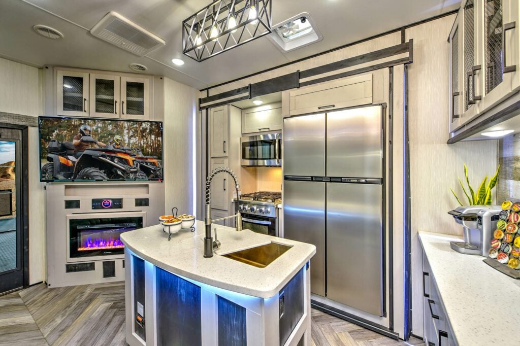 Kitchen and Living Area in a Cyclone Toy Hauler Fifth Wheel