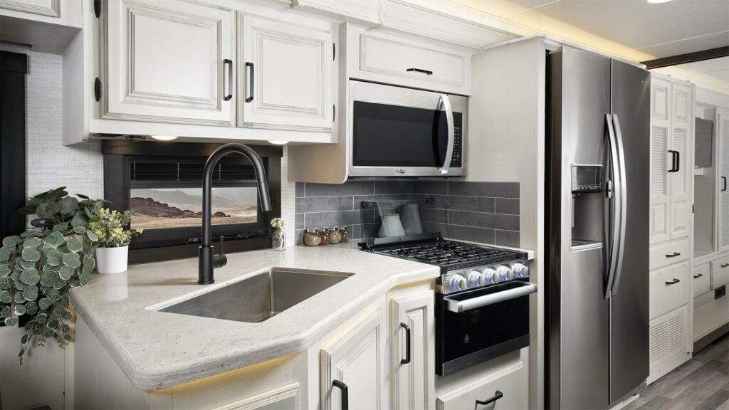 Jayco motorhome interior with white cabinets.