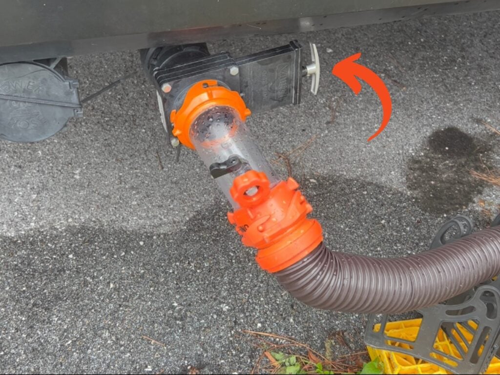 Arrow pointing to closed RV waste valve