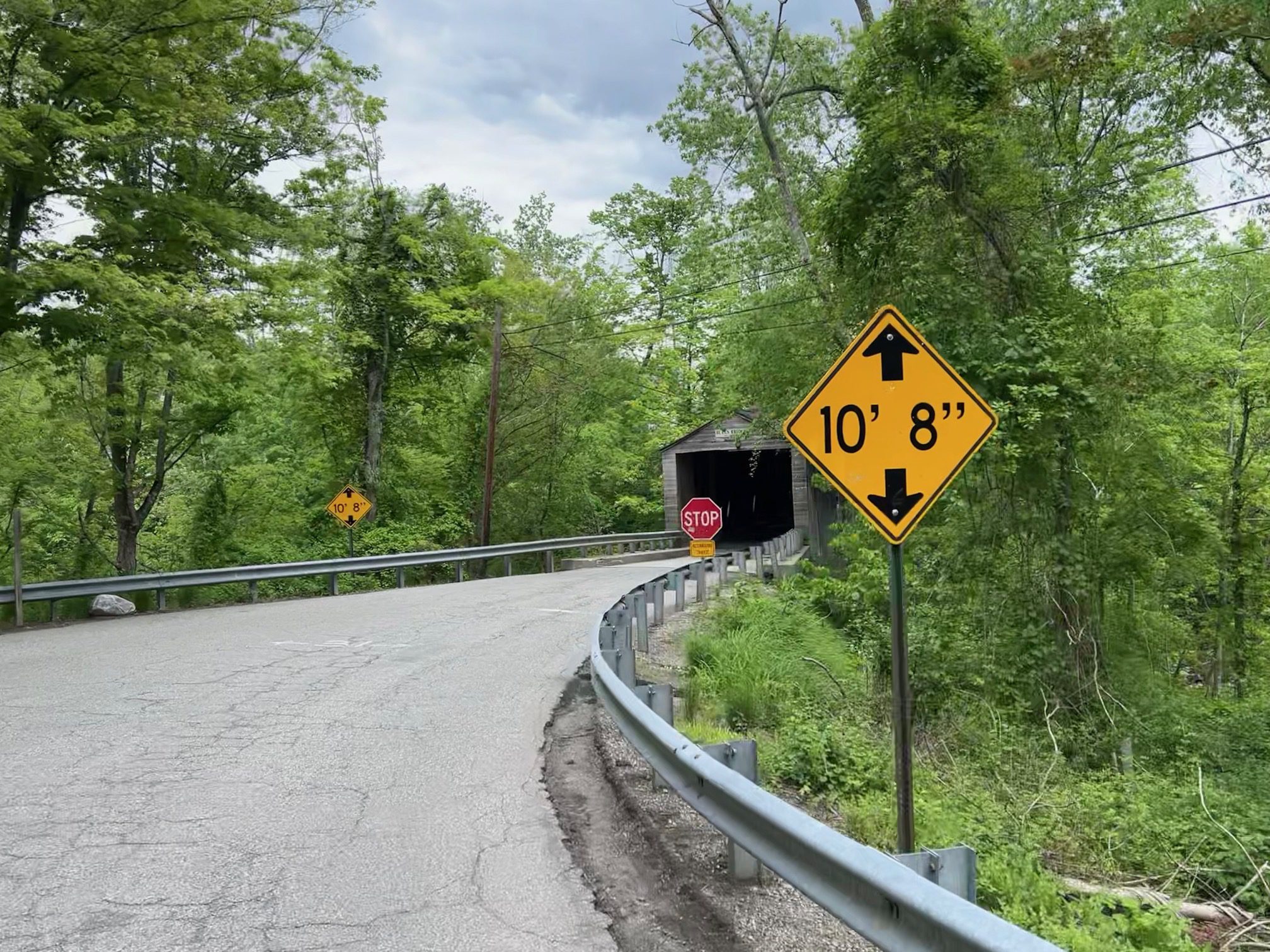 Low clearance covered bridge
