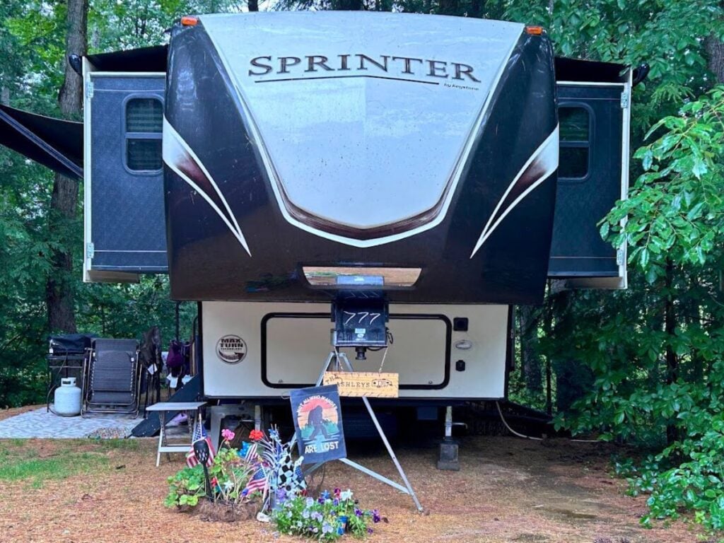 RV with slides extended and slide toppers