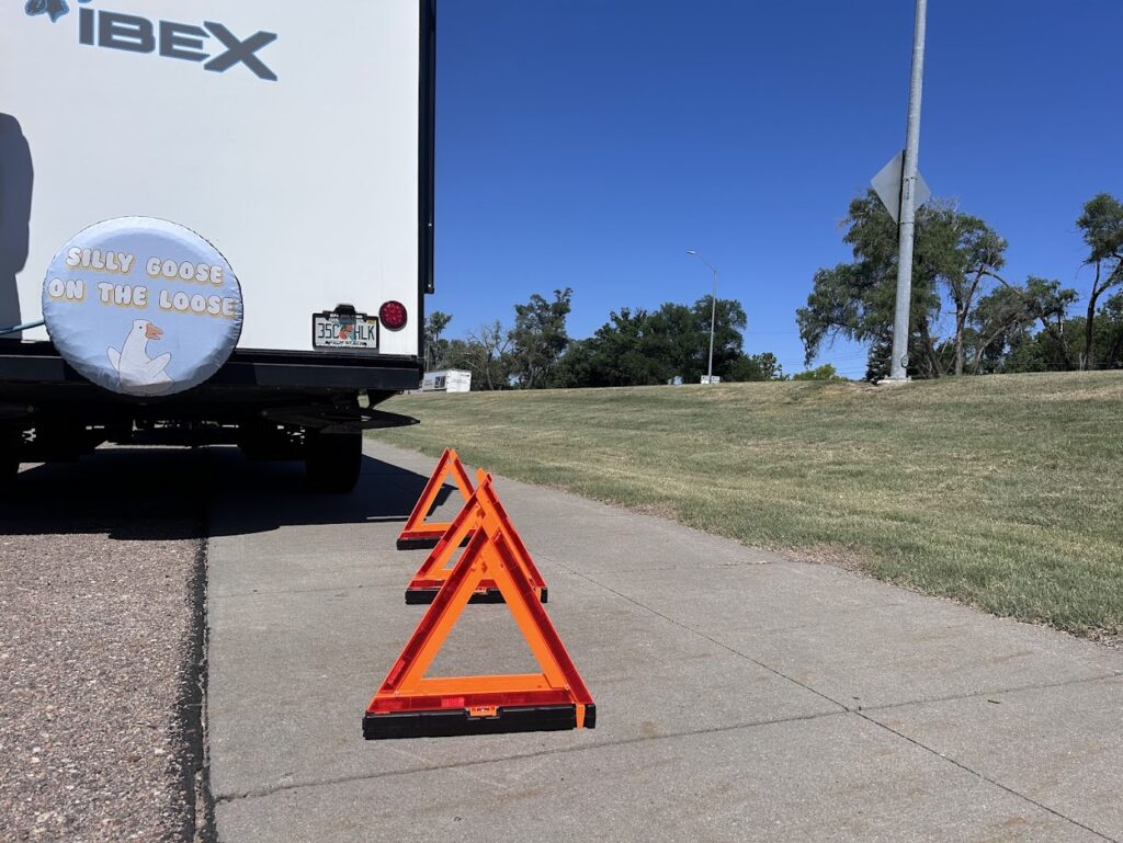 Warning triangles behind travel trailer