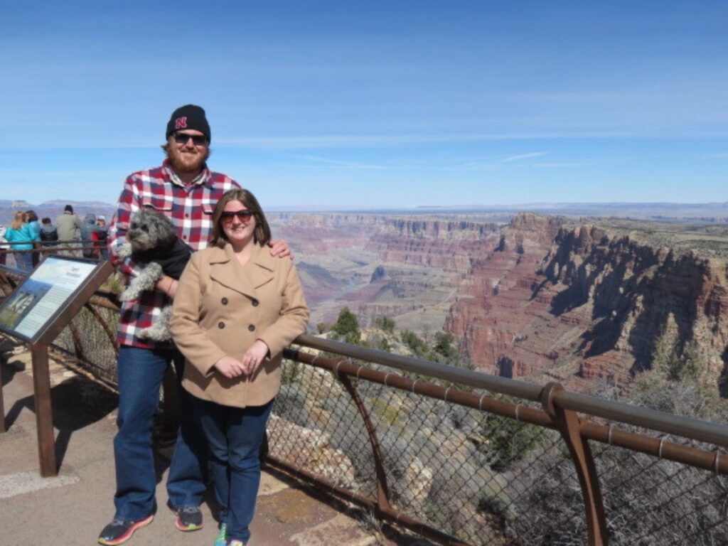 Couple and dog on Rim trail of Grand Canyon