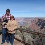 Couple and dog on Rim trail of Grand Canyon