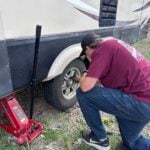 Man working on RV repair