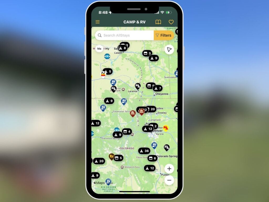 Phone with AllStays Camp and RV app open