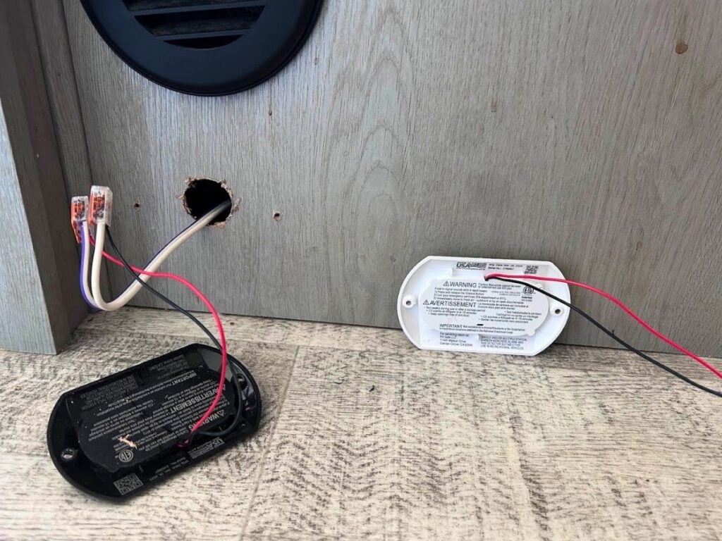 RV gas alarm replacement in progress.
