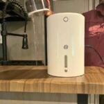 Women emptying RV dehumidifier